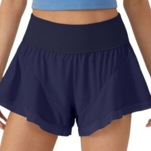NWT Halara Navy Blue High Waisted Contrast Mesh Flutter Hem Quick Dry Shorts